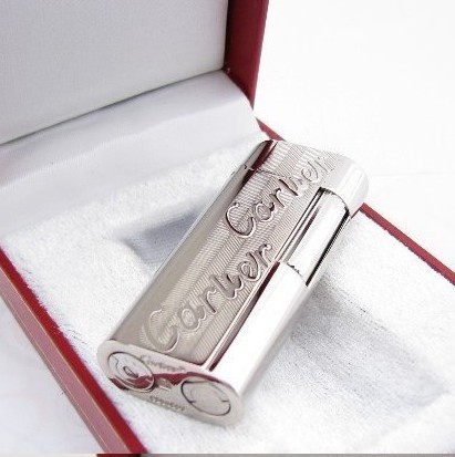 Серебряная зажигалка «Cartier»